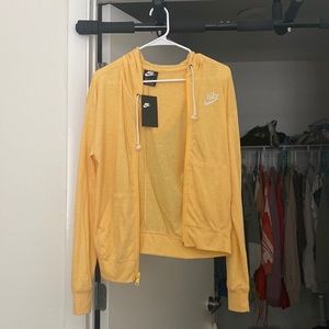 small yellow nike zip up